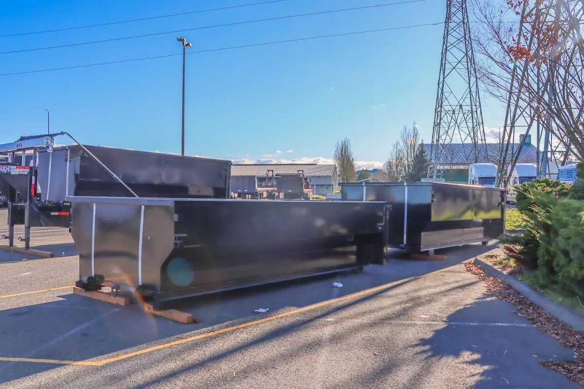 Roll-off dumpster ready for waste disposal at job site for 12 Yard Dumpster Rental in Mila Doce